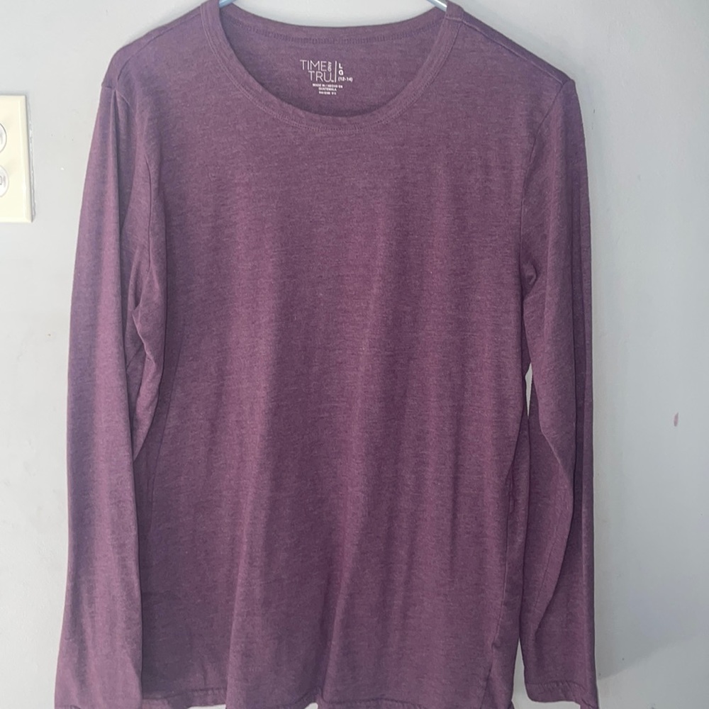 This purple, Long sleeve shirt just isn’t my style anymore. Perfect for any one.